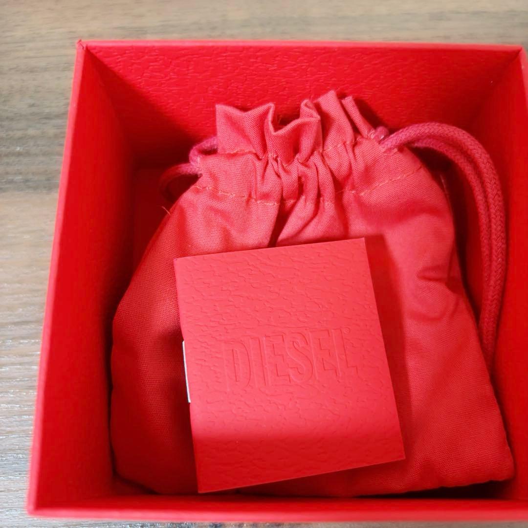 DIESEL シルバー ピアス(片耳用) 赤いポーチ付き