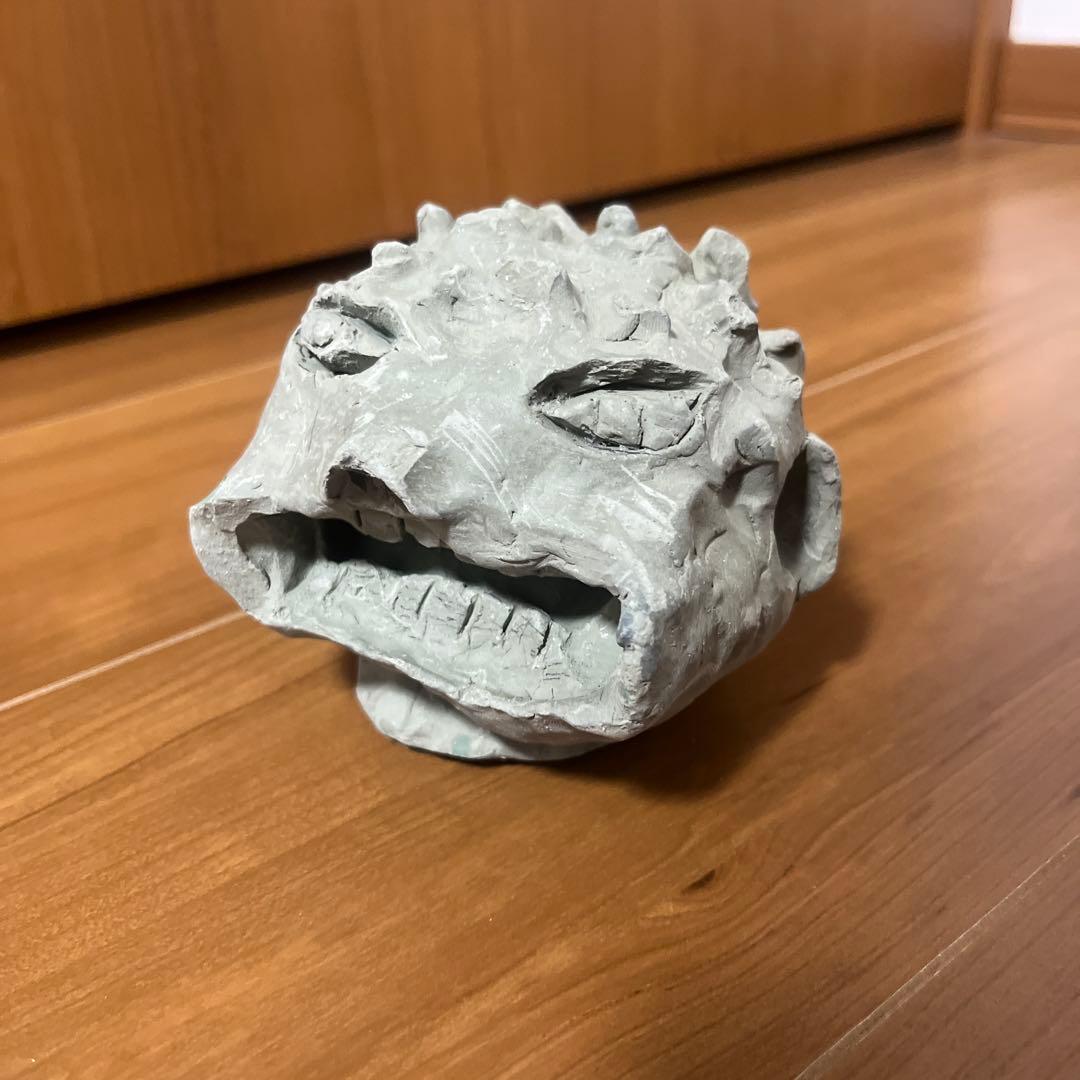 不思議な顔型粘土置物　価値不明。