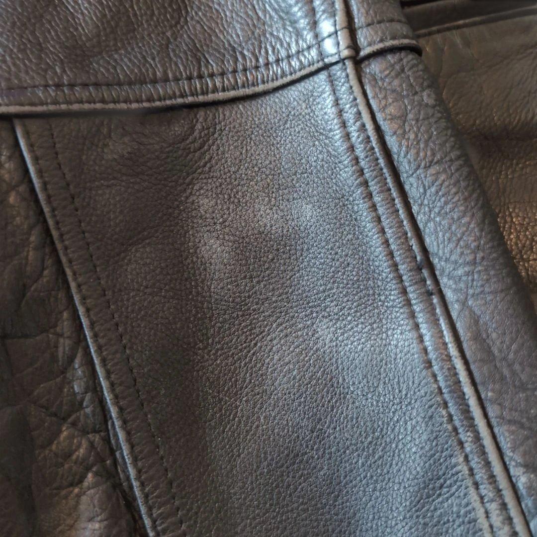 色々難あり。 AVIREX アヴィレックス スタジャン 牛革 アーチロゴ 黒 S