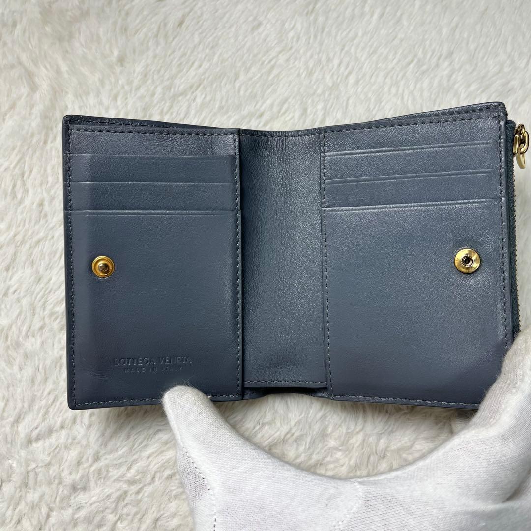 しょBOTTEGA VENETA 折り財布　カセット　グレー