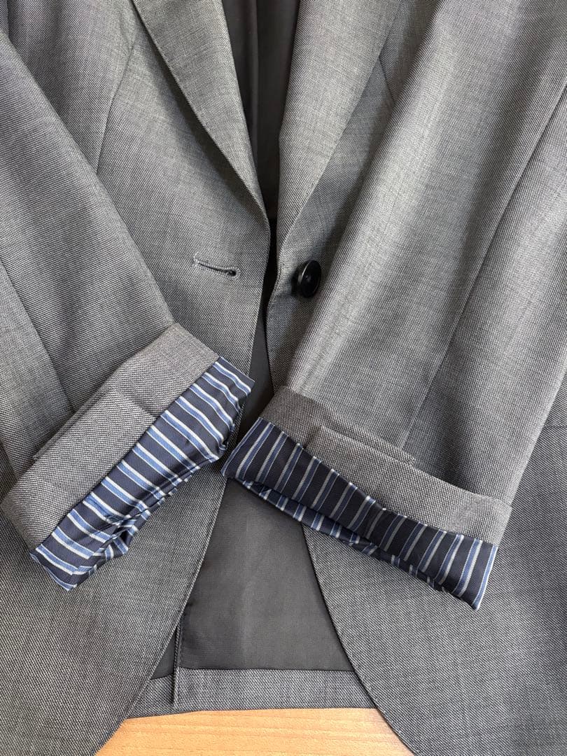 HILTON 洋服の青山　グレー無地パンツスーツ サイズ上11号下13号