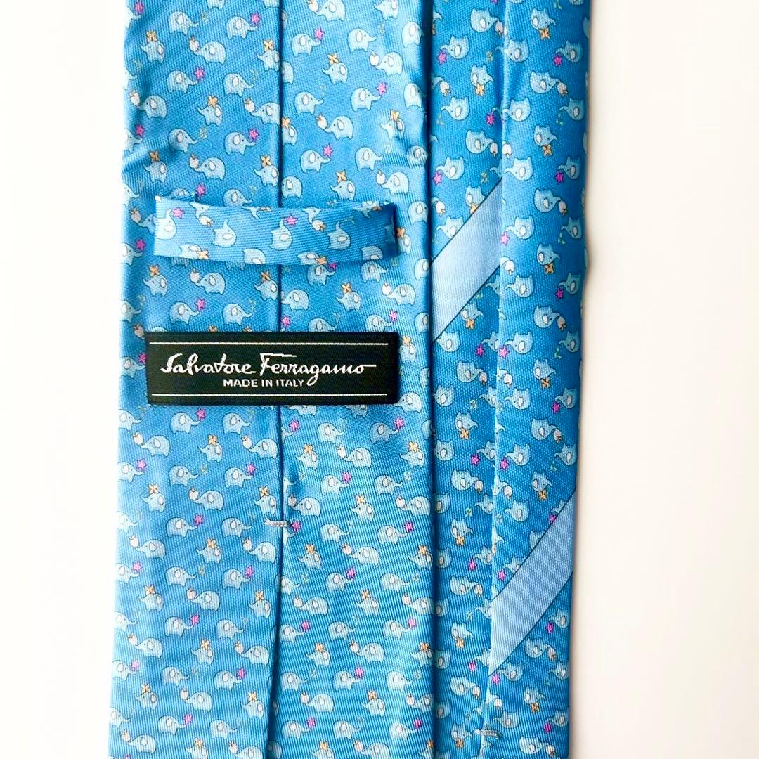 【未使用】フェラガモ シルクネクタイ 小象モチーフゾウ柄総柄 ライトブルー