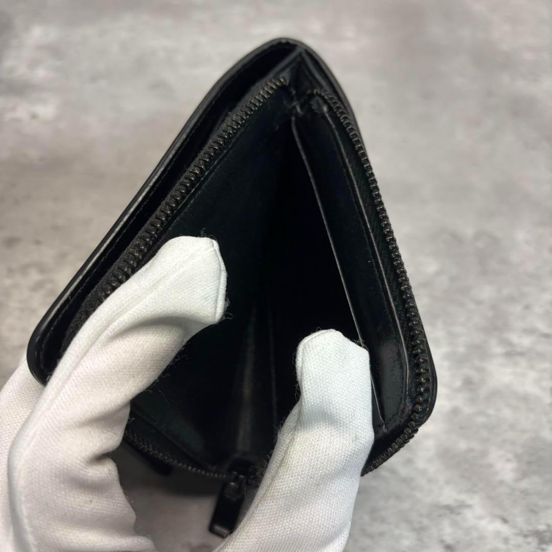 極美品✨サンローラン 二つ折り財布 ラウンドジップ カサンドラ ブラックロゴ 黒