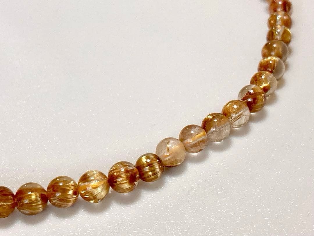 究極品質　超希少幻の逸品　天然石の王者　タイチンルチルキャッツアイの多重編み