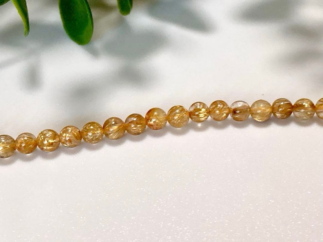 究極品質　超希少幻の逸品　天然石の王者　タイチンルチルキャッツアイの多重編み