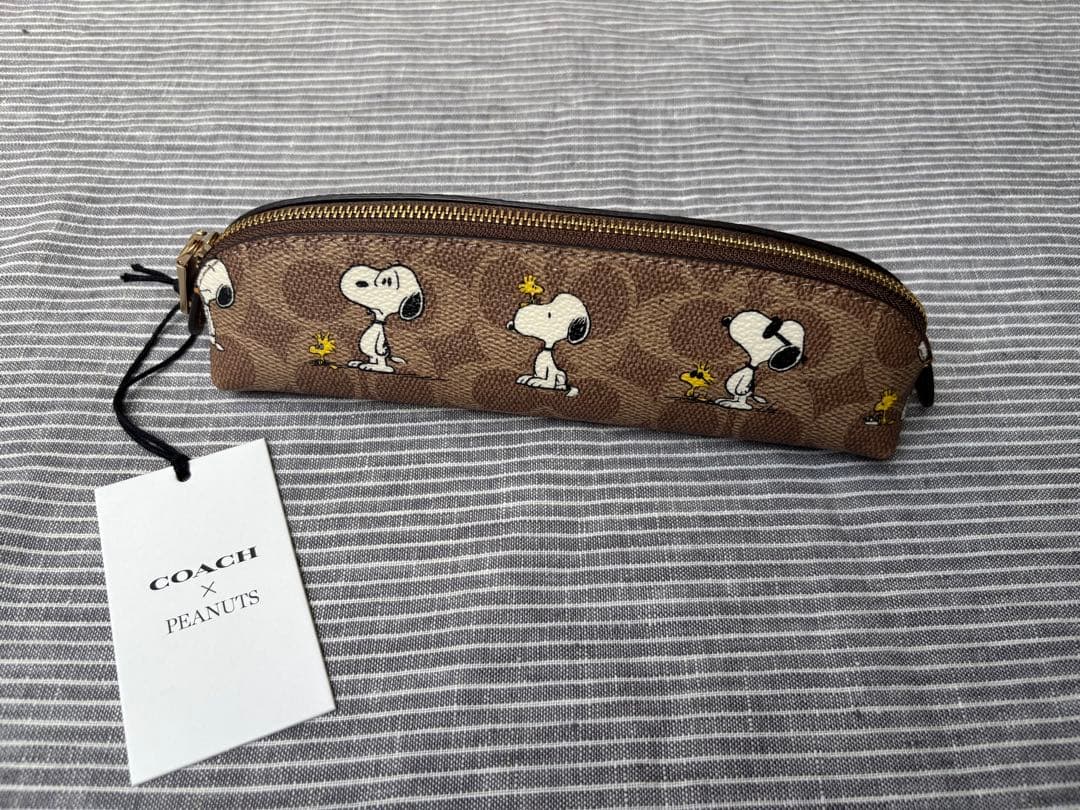 新品　COACH x PEANUTS スヌーピー ペンケース　シグネチャー