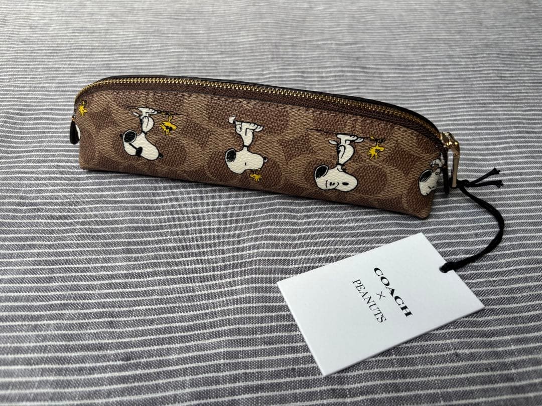 新品　COACH x PEANUTS スヌーピー ペンケース　シグネチャー