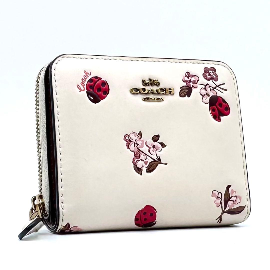 美品✨COACH コーチ 二つ折り財布 レザー てんとう虫 フローラル 日本限定