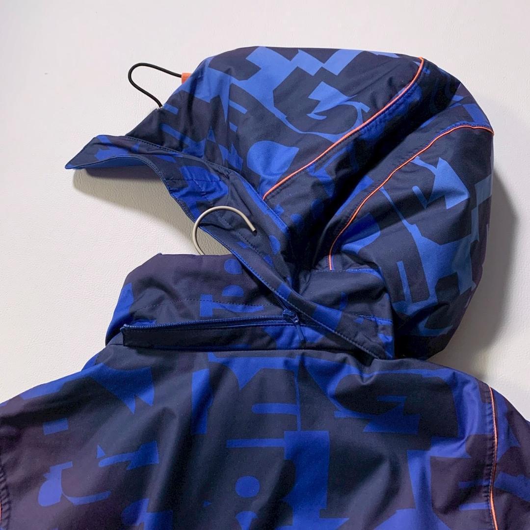 【高機能】デサント スキージャケット モーション3D ヒートナビ 総柄 青 M