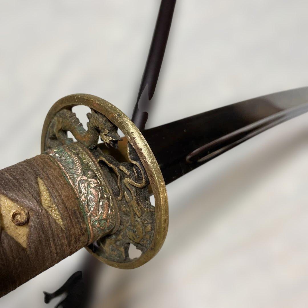 長めの居合刀 灰茶柄 龍彫金縁丸鍔 焦茶梨地鞘