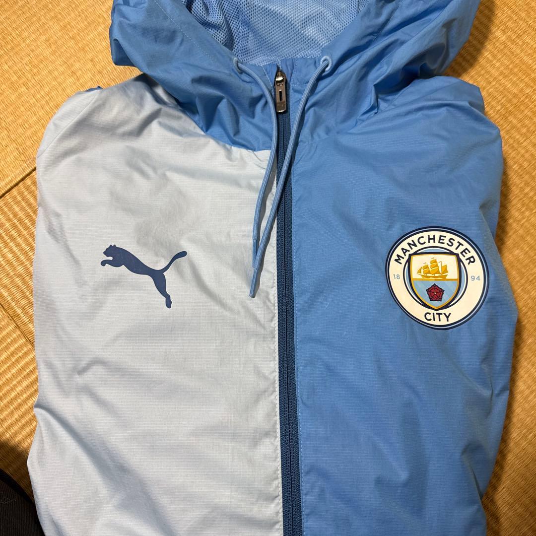 PUMA マンチェスターシティフード付きウィンドブレーカー Lサイズ