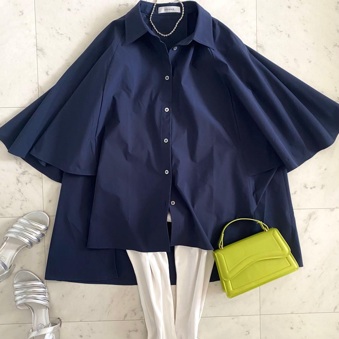 美品 アドーア ADOREスパンライクタイプライターブラウス ポンチョ 紺色