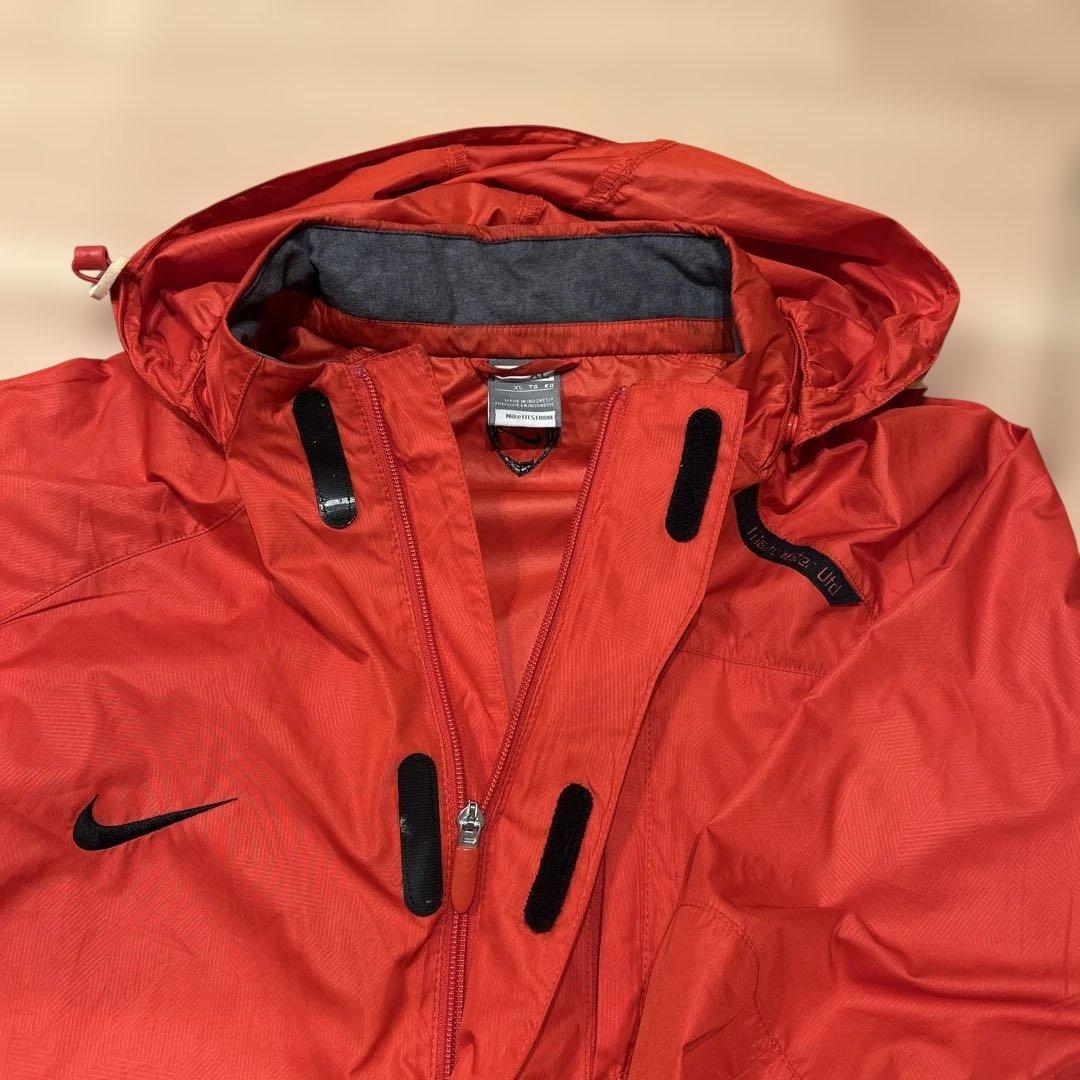 Nike マンチェスター・ユナイテッド ウィンドブレーカー オレンジ