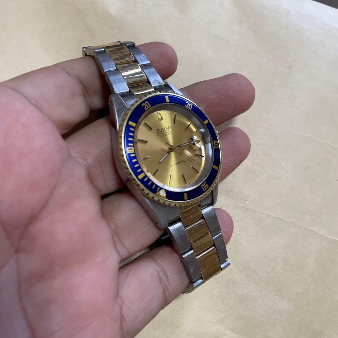 E*y様 Bulova 自動巻き 腕時計 金色/青色