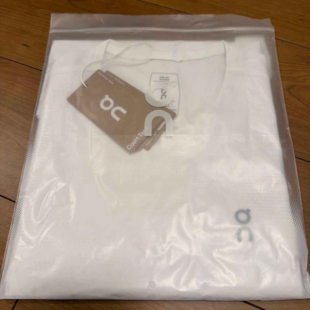 【新品】 on テニスLサイズ 白タンクトップ イガシフィオンテク 全豪オープン