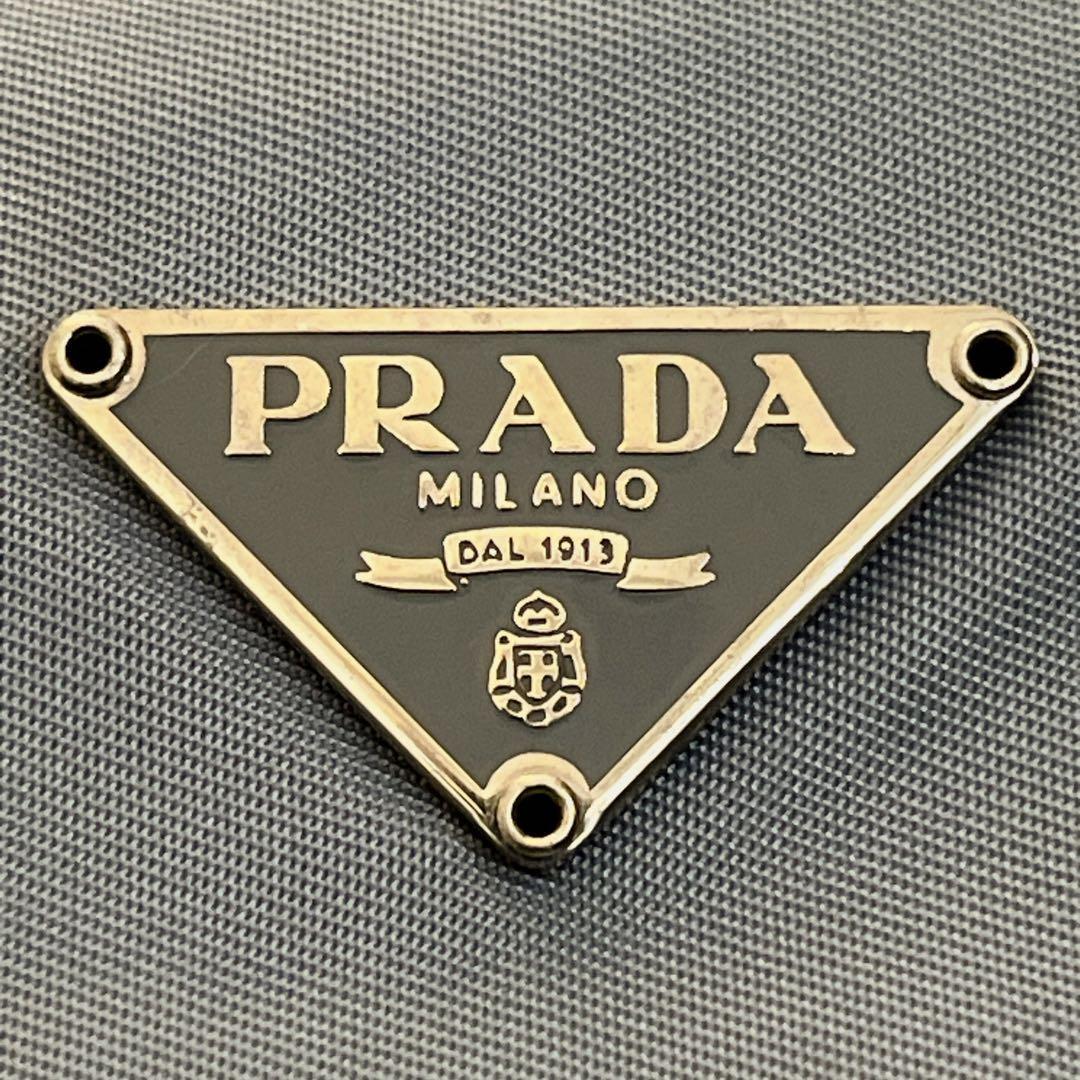 プラダ　ミニポーチ　巾着　化粧ポーチ　小物入れ　水色　ナイロン　三角ロゴ　y2k