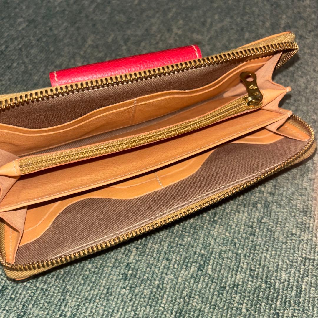 イルビゾンテ　レザー製二つ折り財布 ベージュと赤