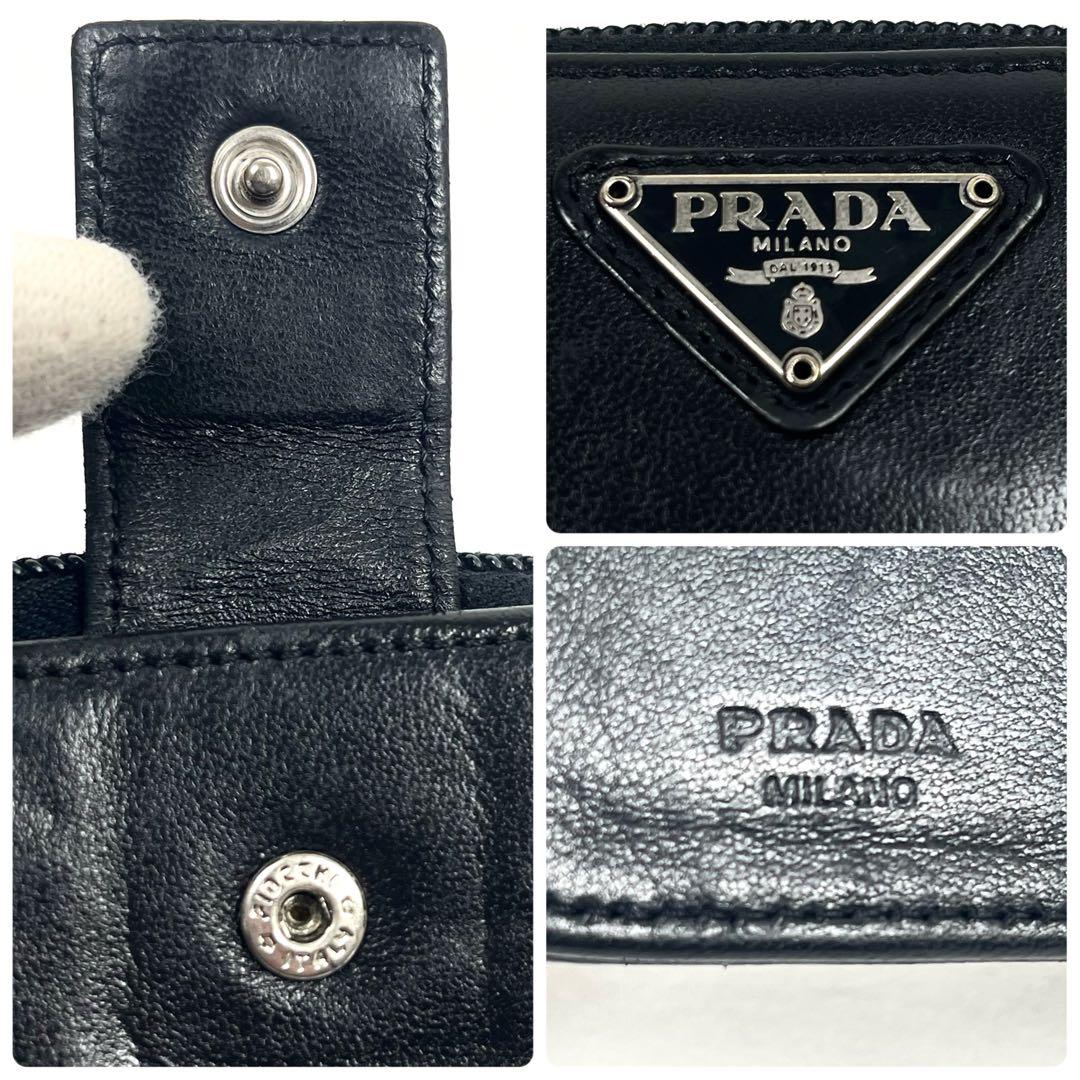 プラダ　二つ折り財布　ラウンドファスナー　三角ロゴプレート　レザー　ブラック