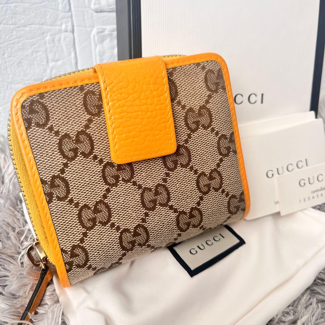 GUCCI 折り財布　GGキャンバス イエロー　ラウンドファスナー