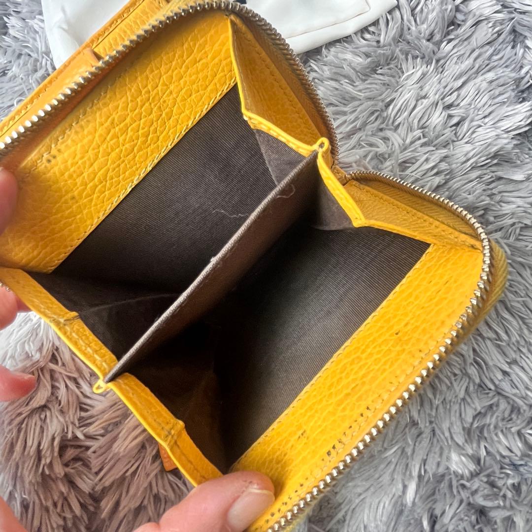 GUCCI 折り財布　GGキャンバス イエロー　ラウンドファスナー