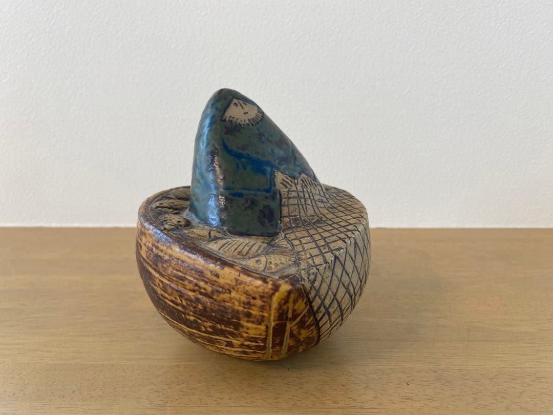 リサラーソン　漁師　Lisa Larson fisherman in boat