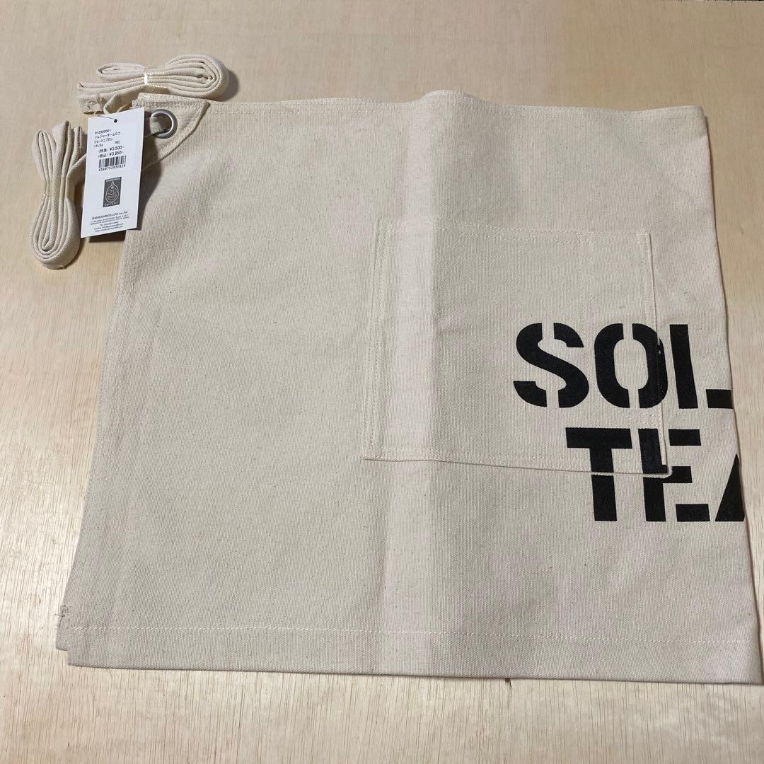 ソルジャーチームロゴショートエプロン　【色:ナチュラル】