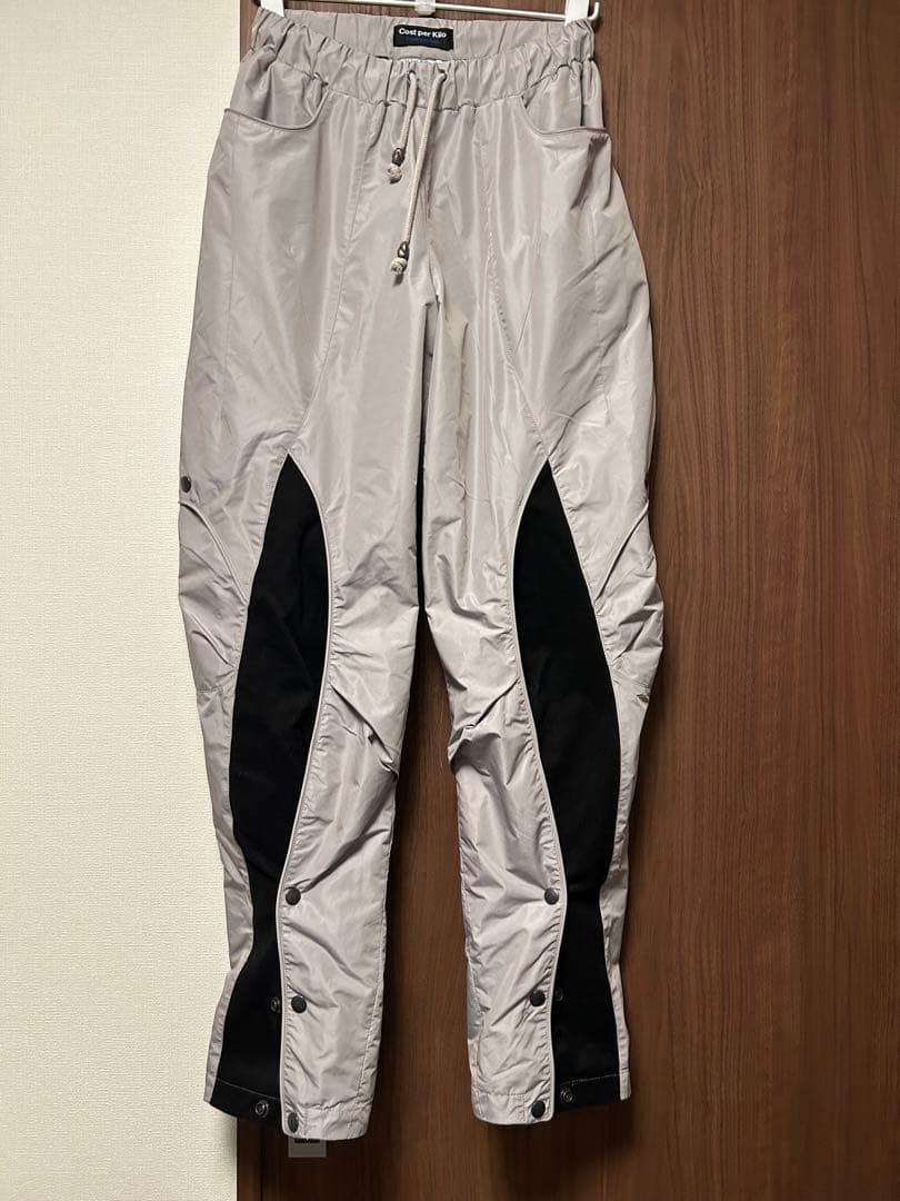 cost per kilo ナイロン　変形　トラックパンツ