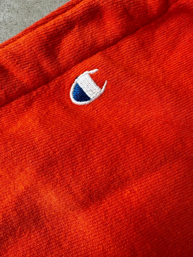 ヴィンテージリメイクChampion ニュースペーパーバック　オレンジ