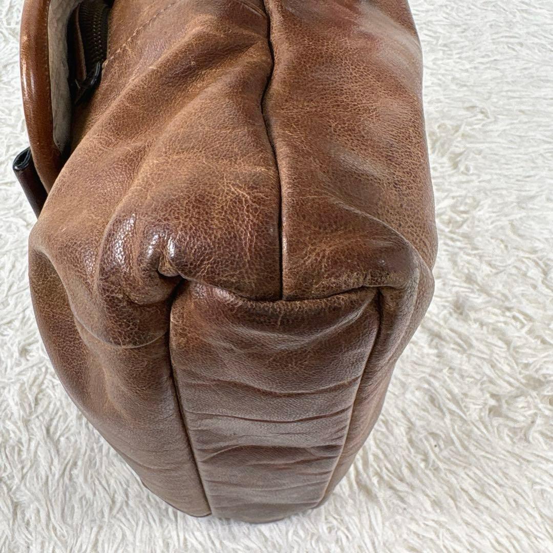 トゥミ　クロスボディバッグ　ショルダーバッグ　ヴィンテージ加工　レザー　ブラウン