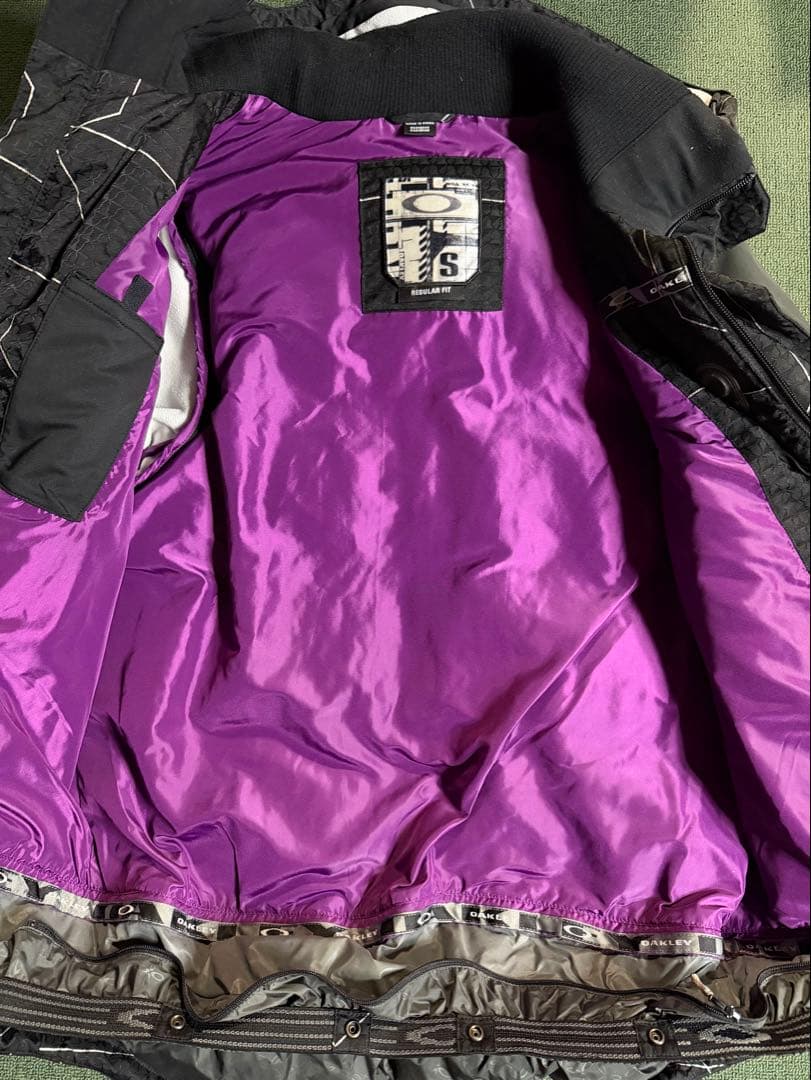オークリー スノーボードウェア ブラック/パープル USのSサイズ