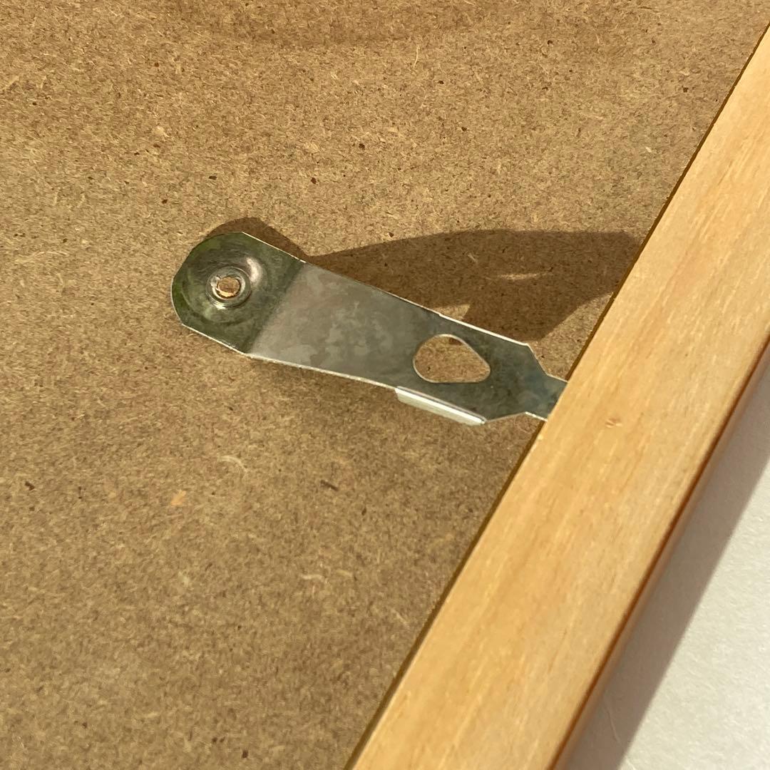 ハワイで購入した40×32センチのウッド額縁。2枚セットで