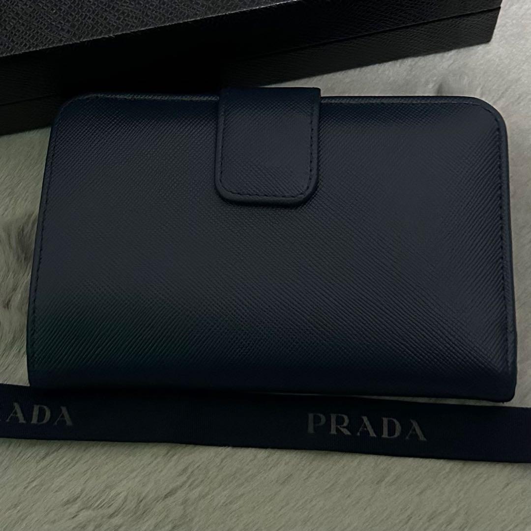 PRADA プラダ　折り財布　ラウンドファスナー　ブルー　ゴールロゴ