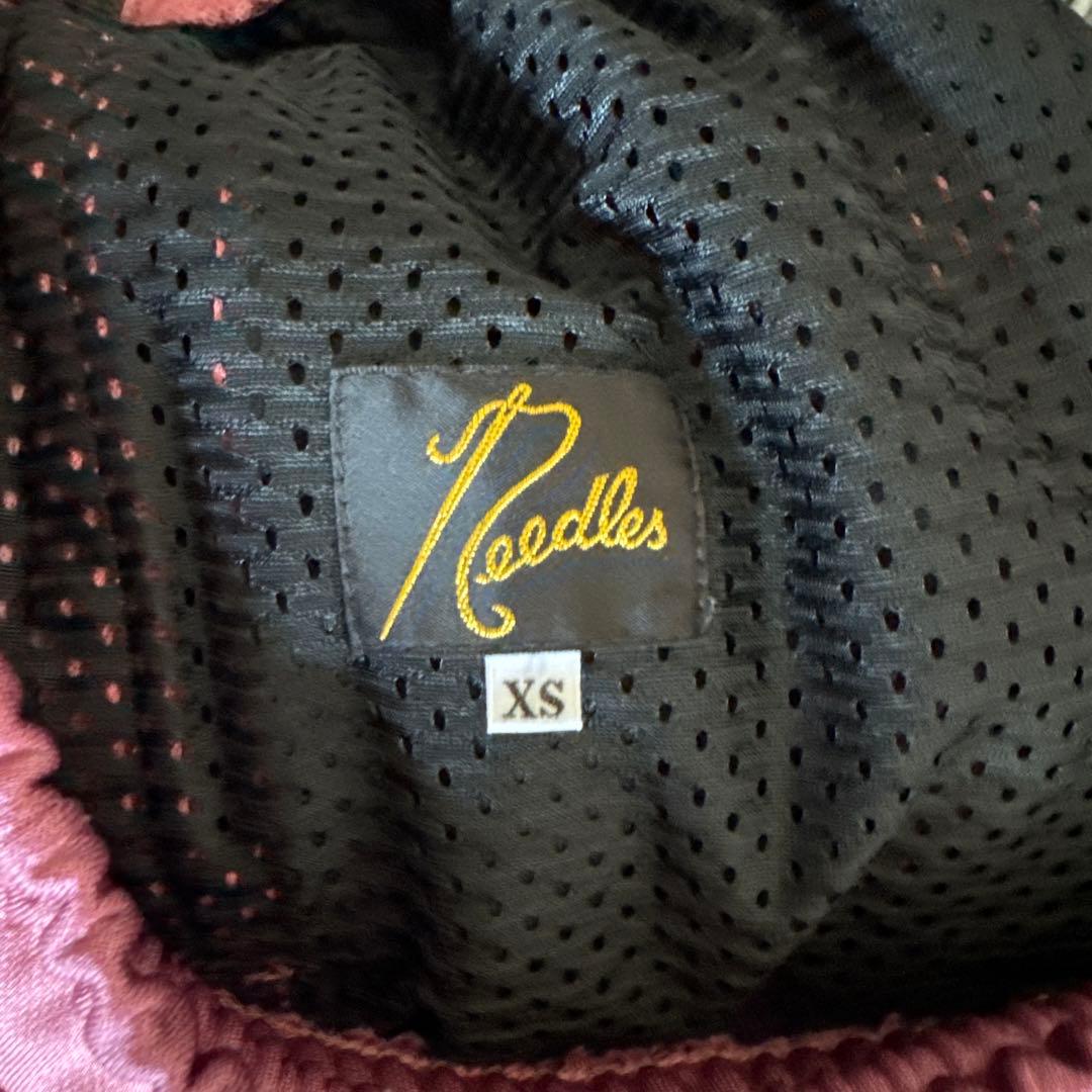 ニードルストラックパンツ