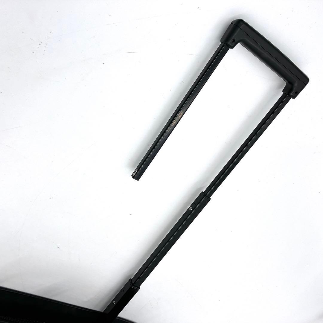 【PRADA】キャリーケース　スーツケース　三角ロゴプレート　ナイロン　黒色