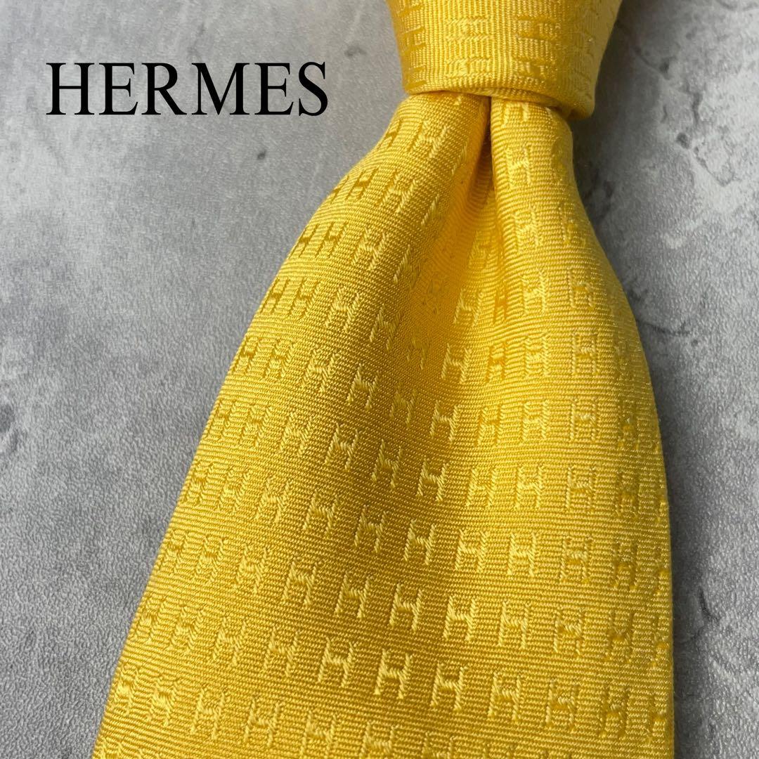 美品 HERMES エルメス H柄 総ロゴ ファソネ ネクタイ イエロー 黄