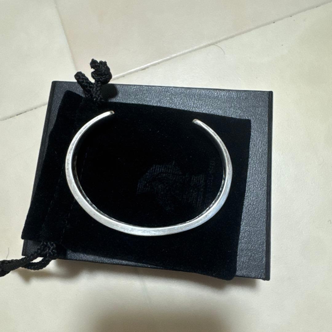 PUERTA DEL SOL シルバー バングル