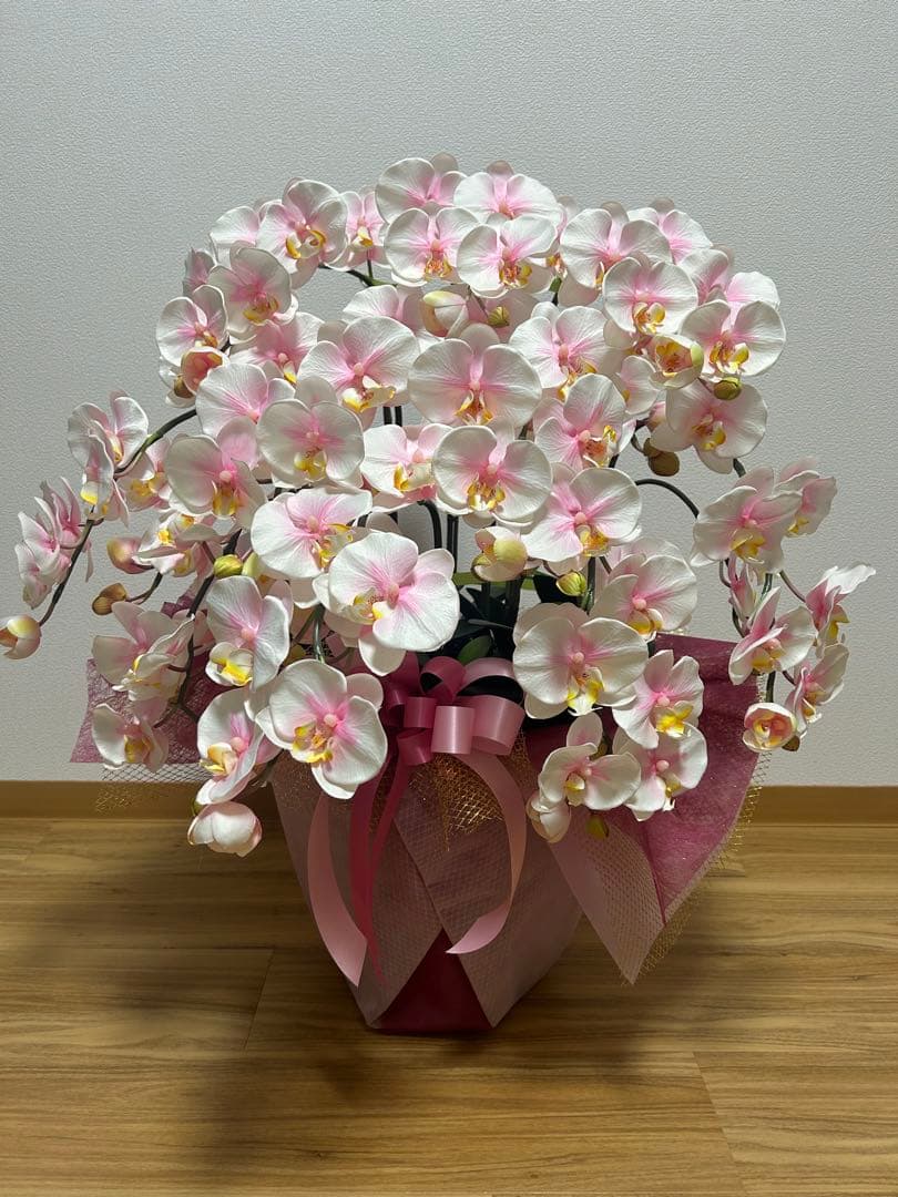 ピンク 胡蝶蘭 スタンド花 リボン付き