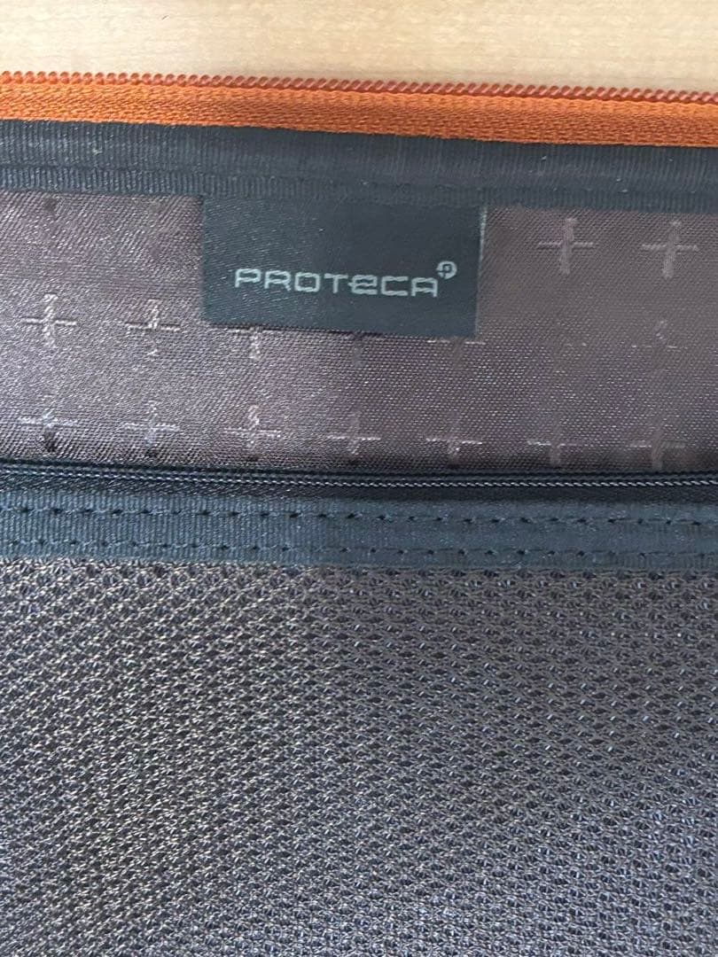 プロテカ　オレンジ キャリーケース 4輪 前面ポケット付き