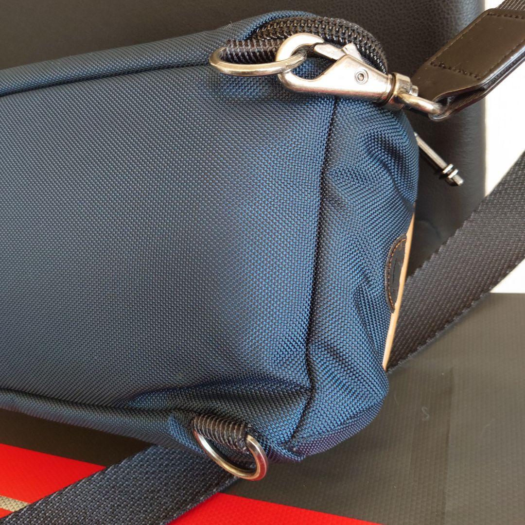 【正規品超美品】TUMI 232399NVYRE ケリー スリングバッグ