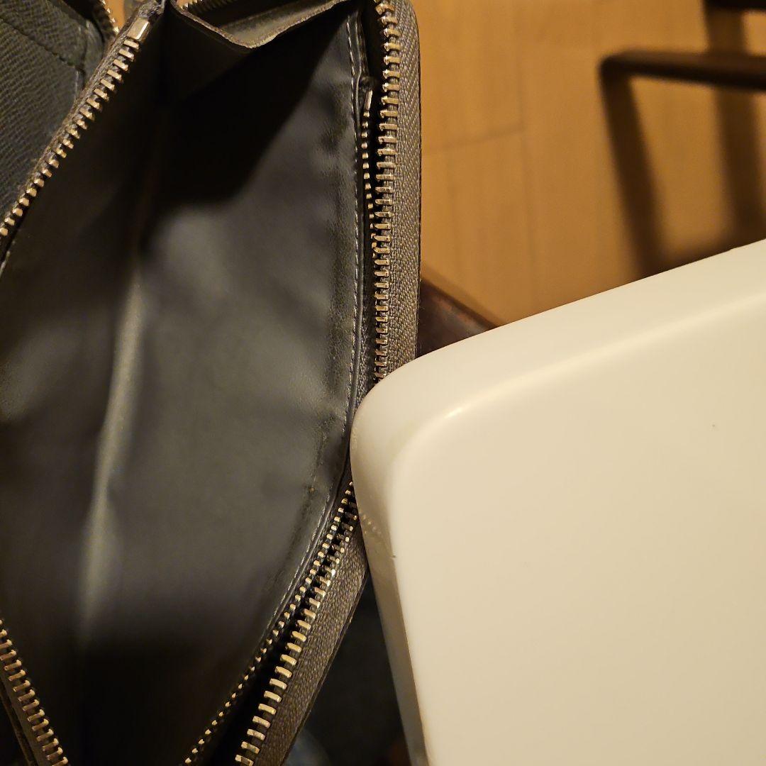 ルイヴィトン タイガ ジッピーウォレット ヴェルティカル 長財布 メンズ