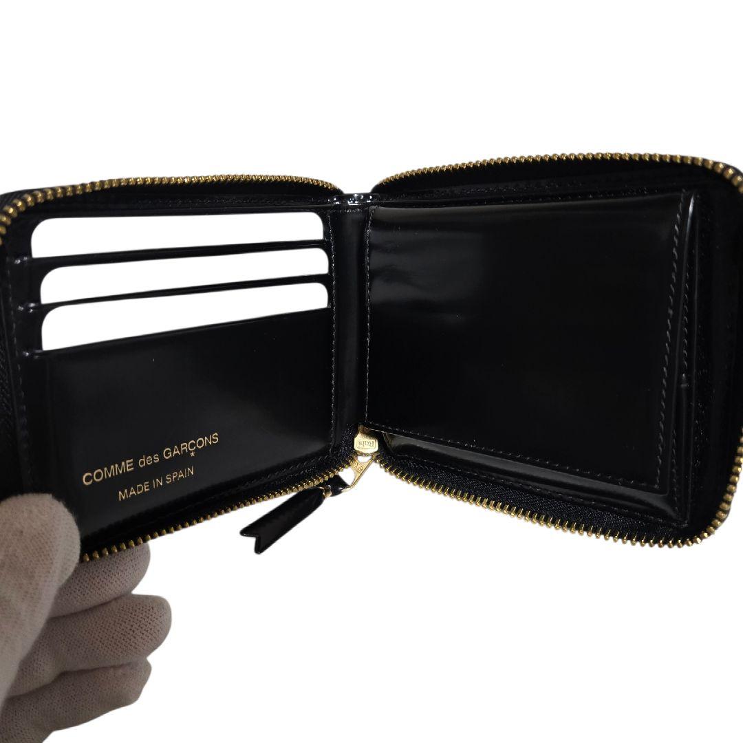 コムデギャルソン 二つ折り ポルカドット ラウンドファスナー黒 SA7100NE