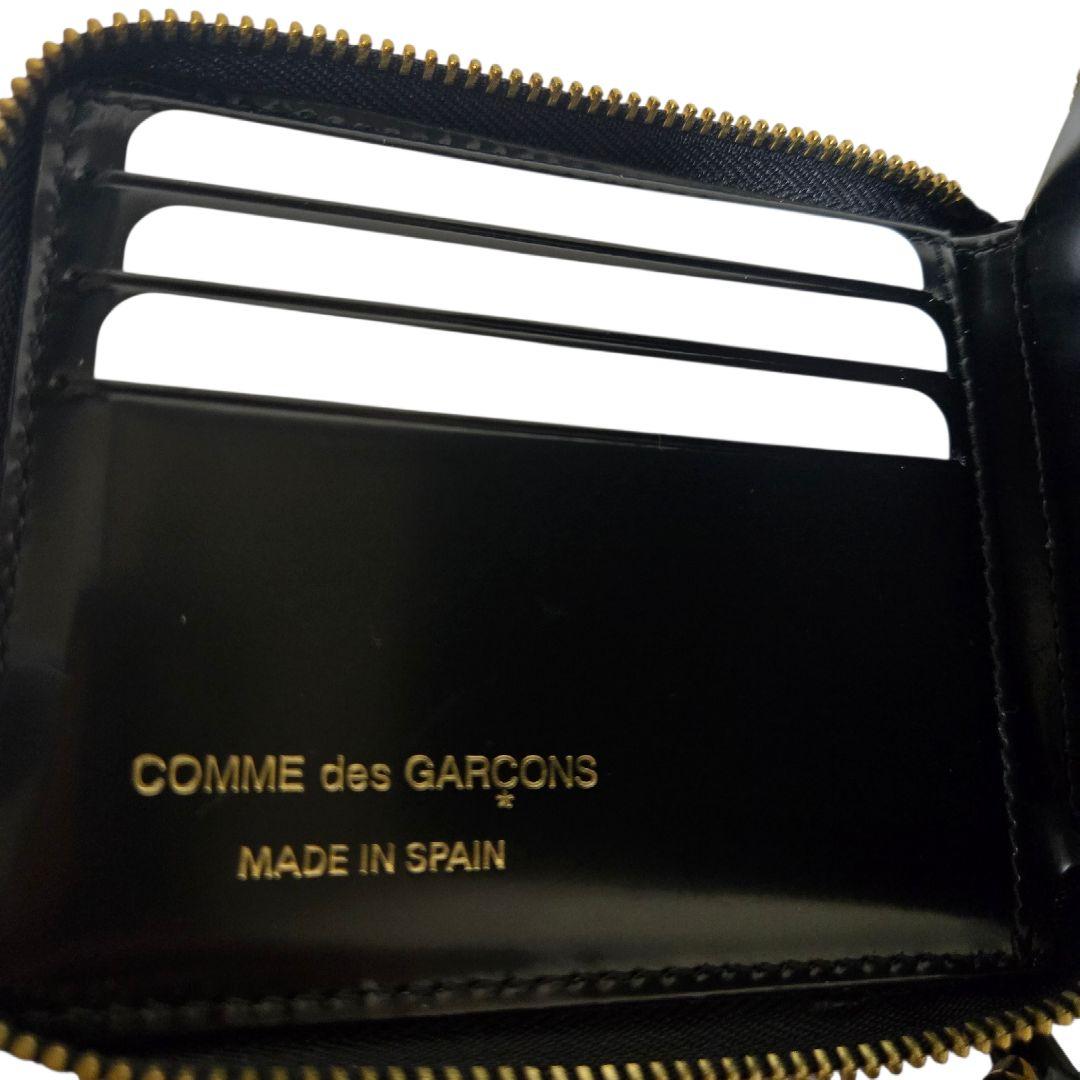 コムデギャルソン 二つ折り ポルカドット ラウンドファスナー黒 SA7100NE