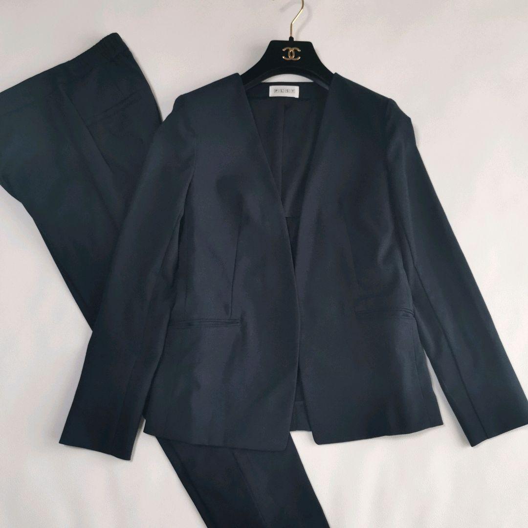 プラステ パンツスーツ ノーカラージャケット セットアップ リネン混 ボタンレス