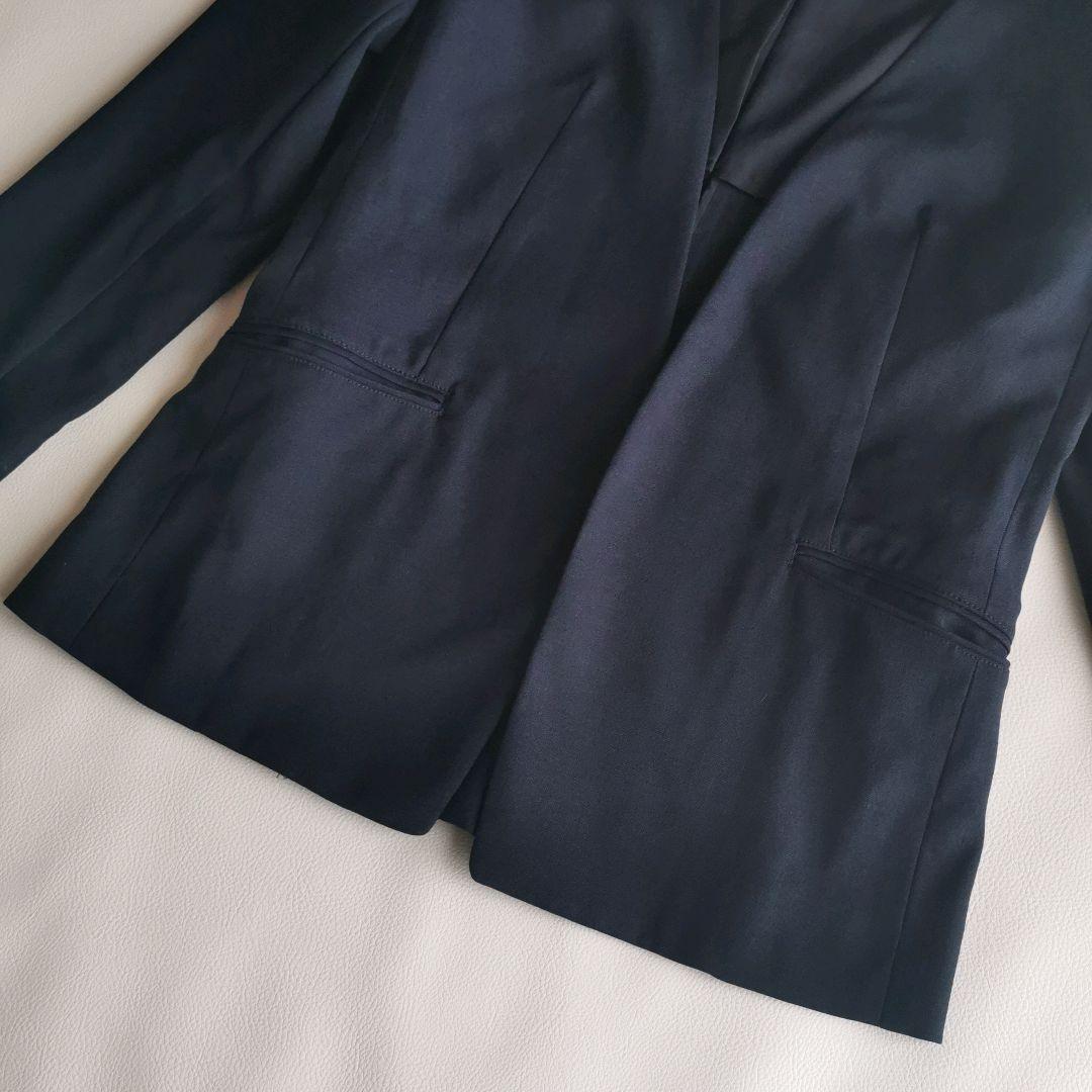 プラステ パンツスーツ ノーカラージャケット セットアップ リネン混 ボタンレス