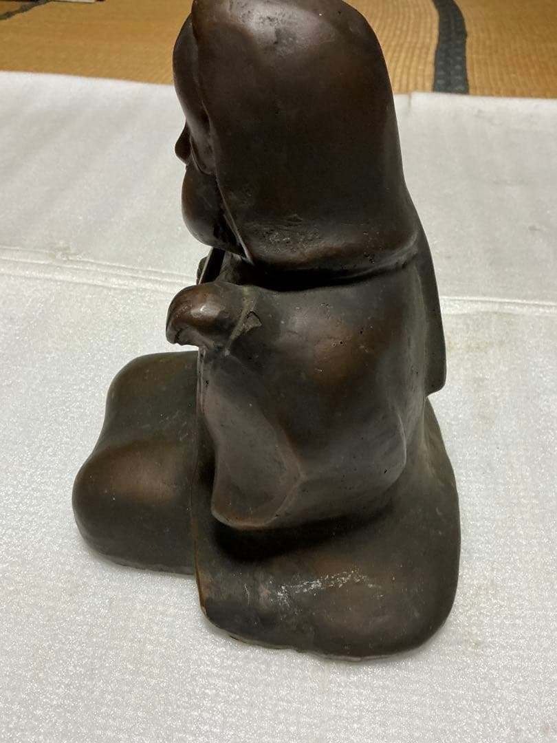 ブロンズ製のお多福さん。【重量が5kgもあります】。