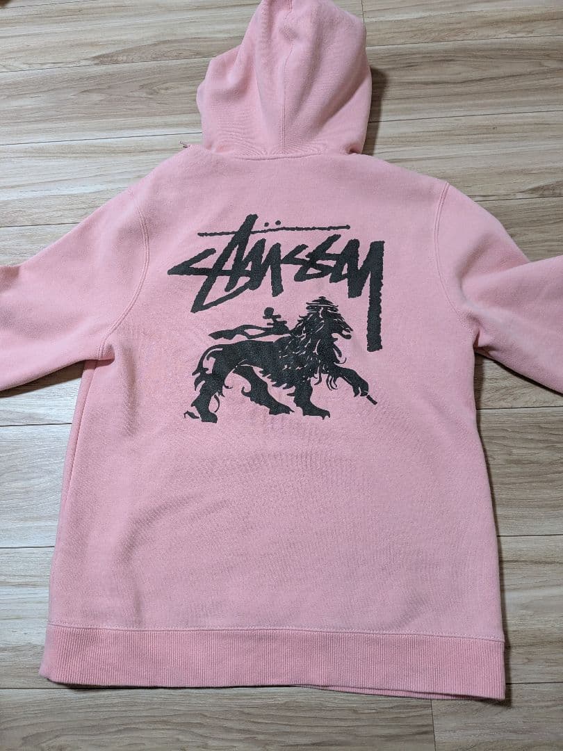 STUSSY　パーカー　ロゴラスタライオン　ピンク　ステューシー