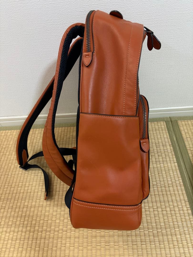 COACH オレンジレザーリュック