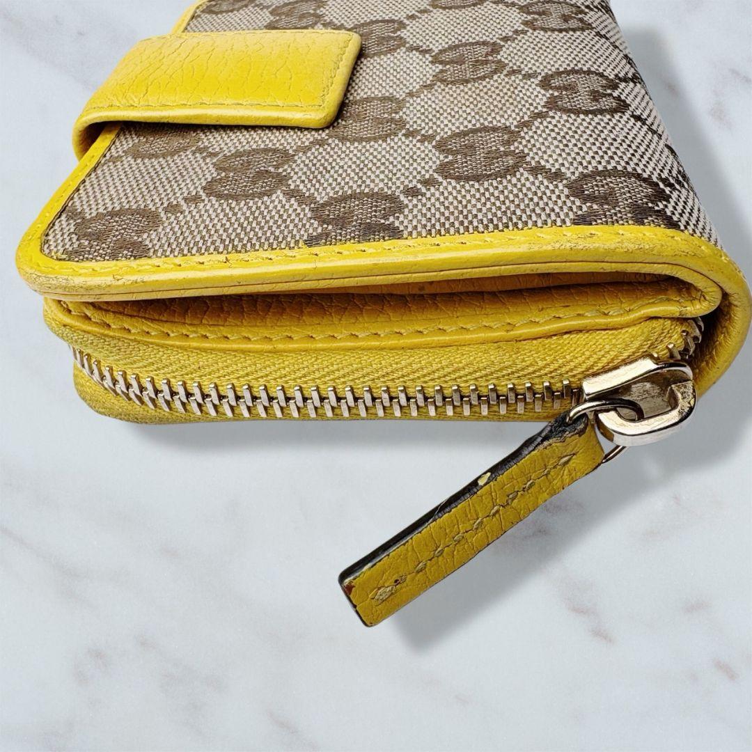 58 GUCCI 二つ折り財布 GGキャンバス h2