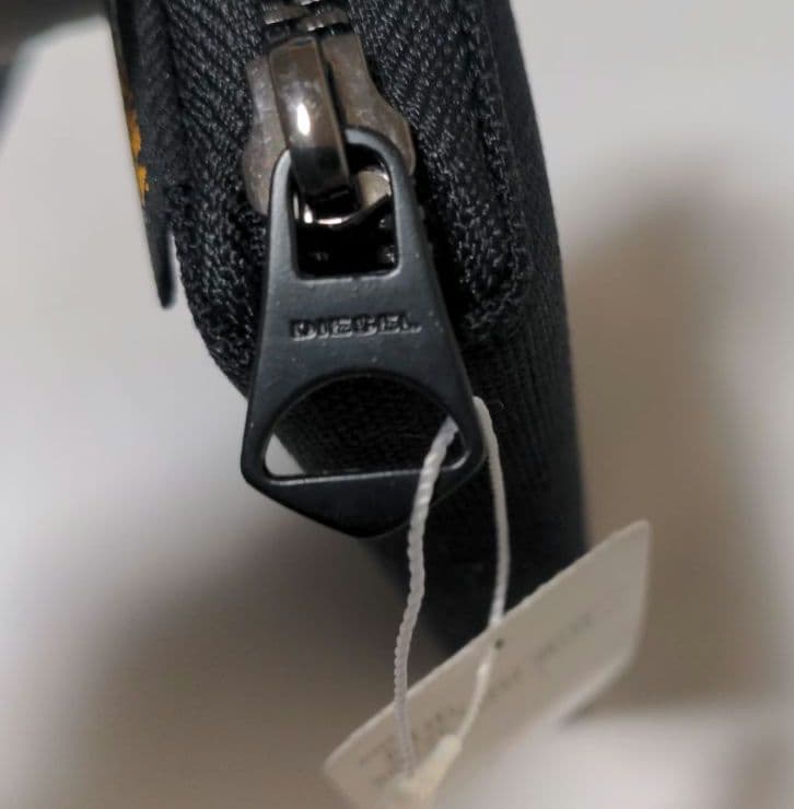 匿名配送★ディーゼル DIESEL 長財布 ラウンドファスナー X06128 黒