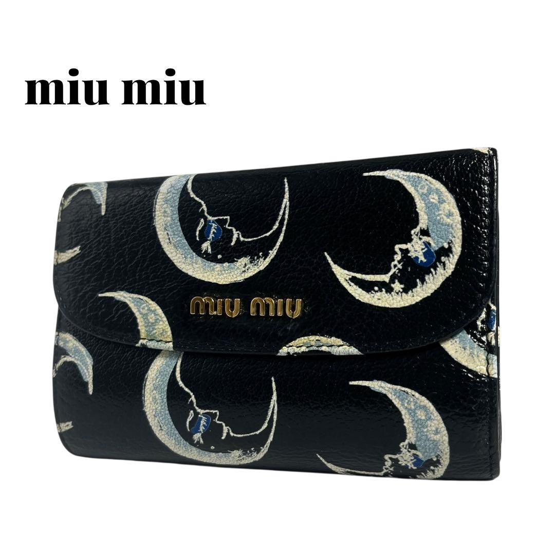 希少✨ミュウミュウ 二つ折り財布 マドラス 総柄 月 ムーン ブラック 黒